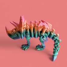 Load image into Gallery viewer, Rainbow Dino Skeleton Toy – Colorful Triceratops-Inspired Figure