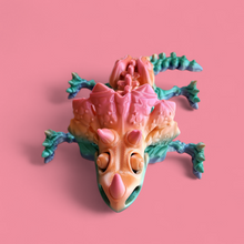 Load image into Gallery viewer, Rainbow Dino Skeleton Toy – Colorful Triceratops-Inspired Figure